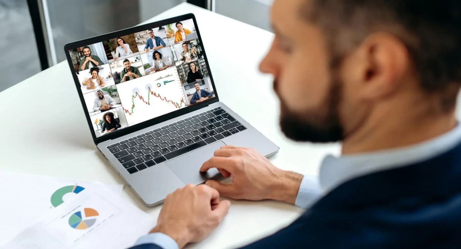 Professional Man Sitting at Laptop